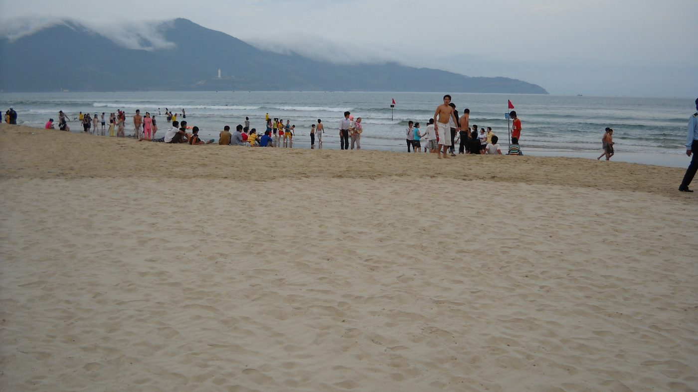 A beach at the foot of the Son Tra peninsula with swimmers